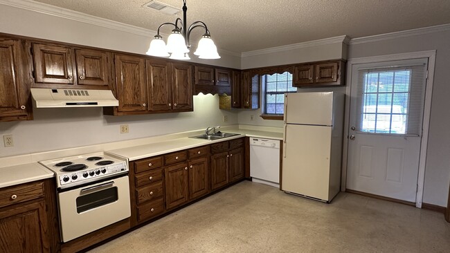 Kitchen includes refrigerator with ice maker, new dishwasher (to be installed 12/22/2022d. - 1418 Brookline Ave SW