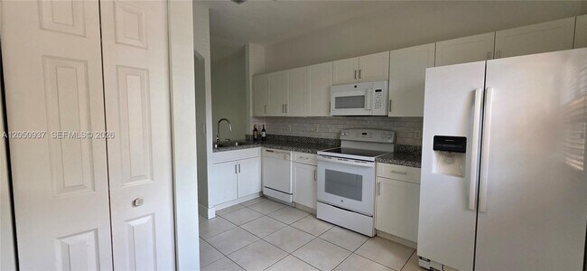 Building Photo - 5670 NW 116th Ave