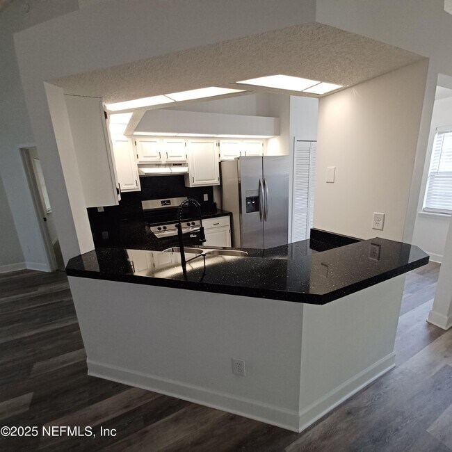 Building Photo - 7775 Mactavish Way S