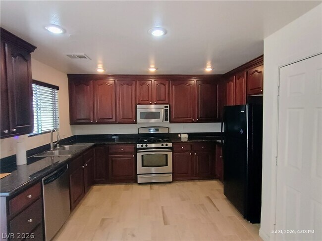 Foto del edificio - 5846 Abbey Rose Ct
