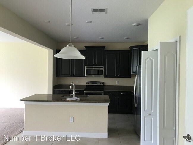 Building Photo - 4 br, 3.5 bath House - 15123 Driftwood Ben...
