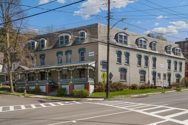 Building Photo - 101-103 N Quarry St &amp; 702-704 E State St - The Compound