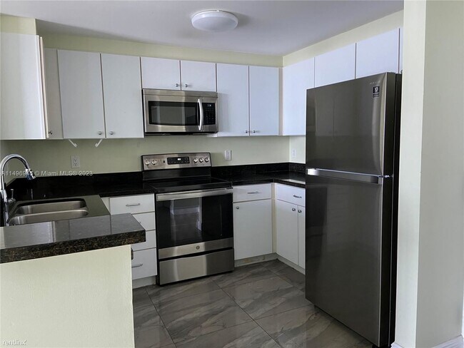 Foto del edificio - 1 br, 1.5 bath Condo - 1250 S Miami Ave Ap...
