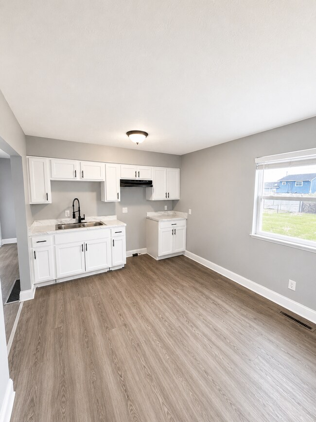 Building Photo - Stylishly Renovated 3-Bedroom Home with Finished Basement & Spacious Fenced Yard