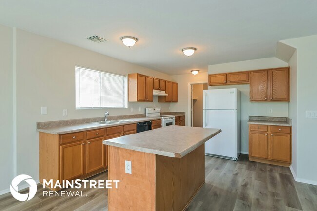 Foto del edificio - 5090 E Butterweed Dr