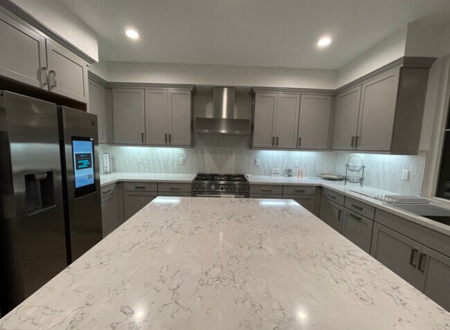 large island for cooking, socializing, eating and more - 1609 Country Manor Dr