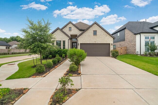 Foto del edificio - 10718 Blossom River Dr