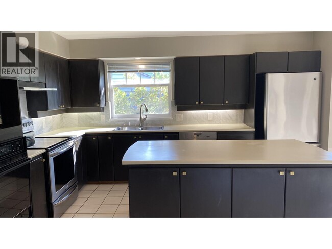 Photo du bâtiment - 520 W 26th Ave