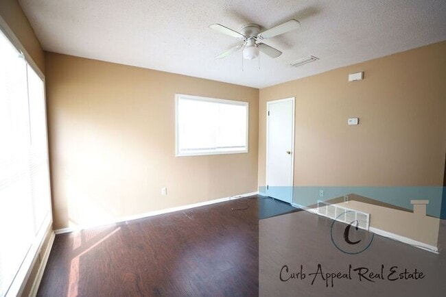 Building Photo - This 2 bedroom 1 bath apartment - includes refrigerator, stove and dishwasher.