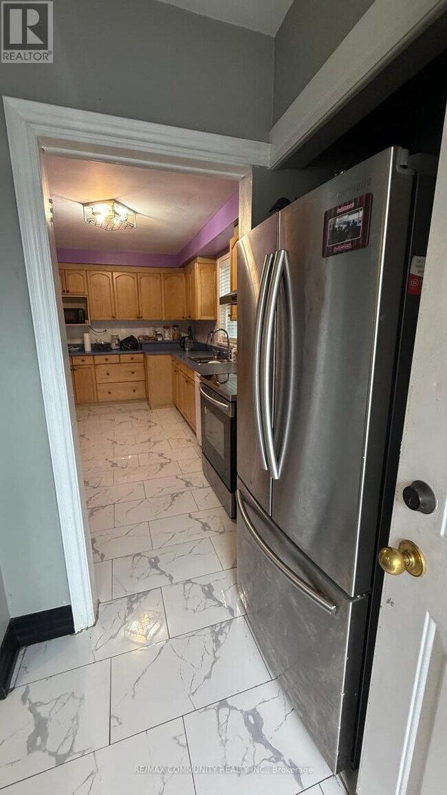 Photo du bâtiment - 591 Harmony Rd S