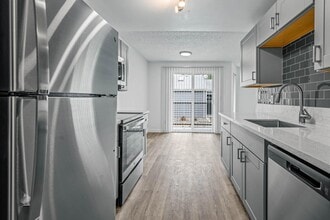 Building Photo - Oak & Iron Flats by Trion Living