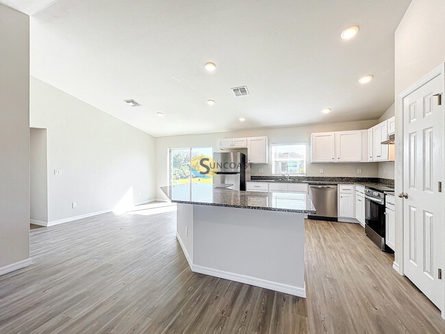 Building Photo - TOUR TODAY - Modern 4-Bedroom Home for Ren...