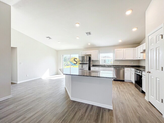 Foto del edificio - TOUR TODAY - Modern 4-Bedroom Home for Ren...