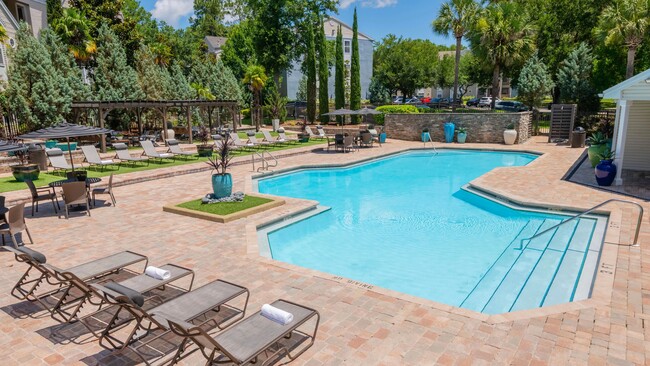 Enjoy resort-style living with our gorgeous pool and sundeck! - The Oasis at 1800