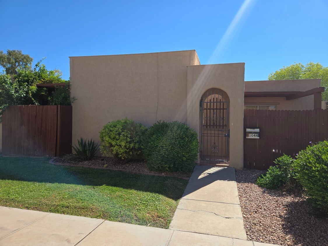 2 patios-to the L/R of gated entrance - 1044 E Pueblo Rd