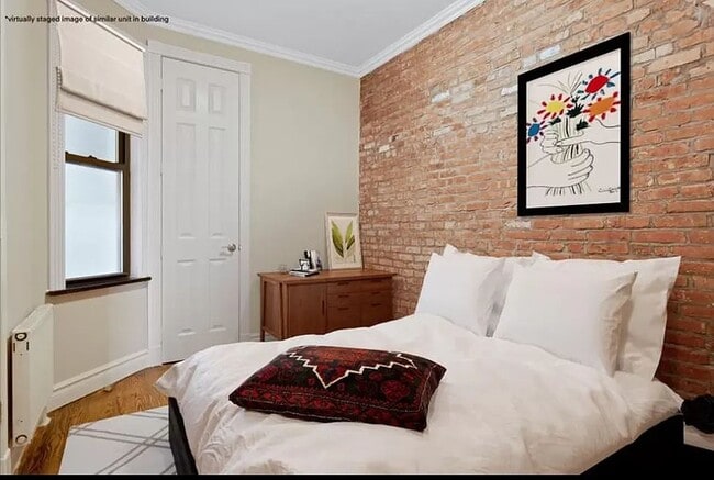 Building Photo - 204 E 13th St