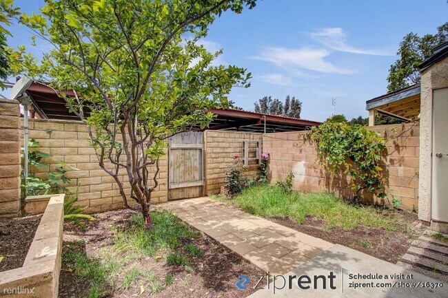 Building Photo - 3 br, 1.5 bath Condo - 6631 Wilbur Avenue,...