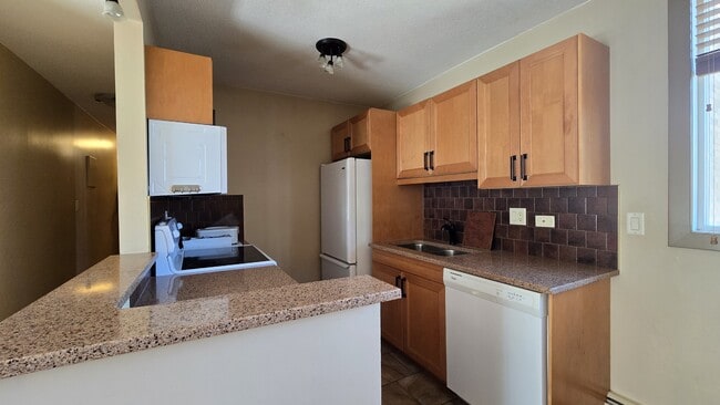 Photo du bâtiment - 1706-1711 11 Ave SW