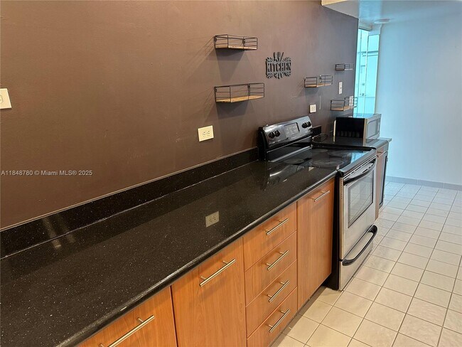 Building Photo - 6039 Collins Ave