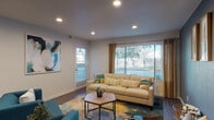 This single-floor residence offers a thoughtfully designed layout with modern finishes and a cohesive, contemporary aesthetic. The spacious living area serves as the heart of the home, featuring recessed lighting, wood-style flooring, and large windows that flood the space with natural light while providing views of the surrounding greenery. Vibrant teal and cream furnishings complement bold abstract artwork, creating an inviting and stylish atmosphere. A secondary lounge area features a distinctive slate-blue accent wall adorned with framed botanical prints, adding a sophisticated touch. The kitchen is well-equipped with dark espresso cabinetry, granite-style countertops, stainless steel appliances, and a pass-through counter that connects to the dining area, offering both functionality and style. The bedroom is a serene retreat with plush carpeting, soft natural light filtering through a sliding window with outdoor views, and direct access to an en-suite bathroom. Two bathrooms serve the residence — one featuring a dark vanity with a large mirror and a shower-tub combination, and the other equipped with a sleek sliding-glass shower enclosure. Throughout, the space balances comfort and modern design seamlessly.