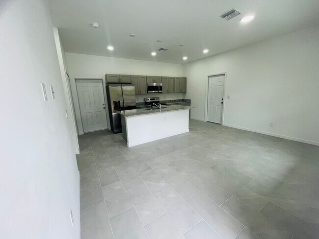 Building Photo - BRAND NEW CONSTRUCTION- ONE OF A KIND-ONE BEDROOM, ONE BATH-ONE CAR GARAGE- LEHIGH ACRES