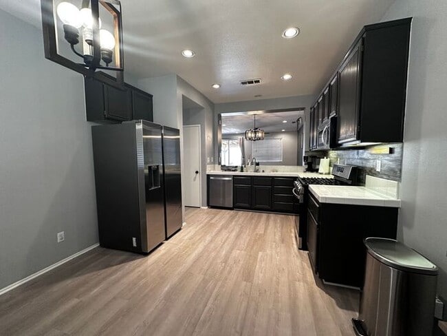 Building Photo - Welcome to your perfect blend of comfort a...