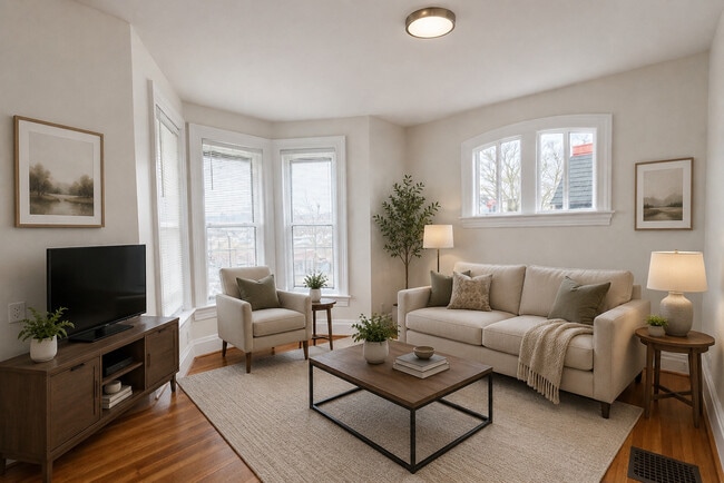 Furniture shown in photos is for staging and demonstration purposes only - 265 Alexander St