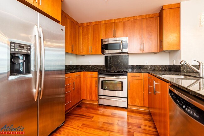 Building Photo - Axis Condominiums | Downtown Living | Full Service Building