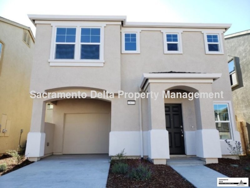 Foto principal - BRAND NEW Home in Gated Community!