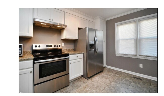 Foto del edificio - Charming 2-bedroom, 2.5-bathroom townhouse...