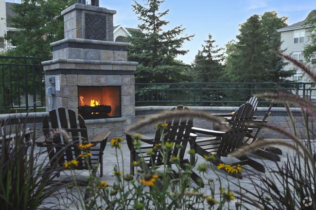 Poolside Fireplace - Yorktown Estates