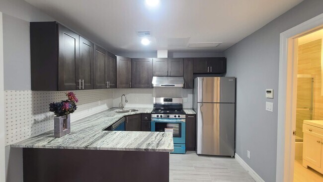 Foto del edificio - 100 Griffith St