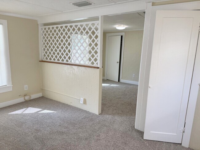 Dormitorio convertido en sala de estar - 832 1st St N