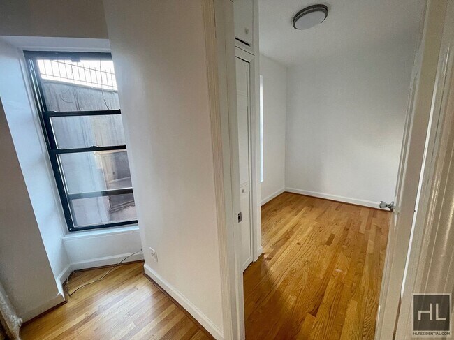 Building Photo - SUNNY 3 BEDROOM ON EAST 7 STREET
