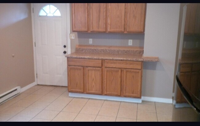 kitchen to rear exit - 103 W Chestnut St