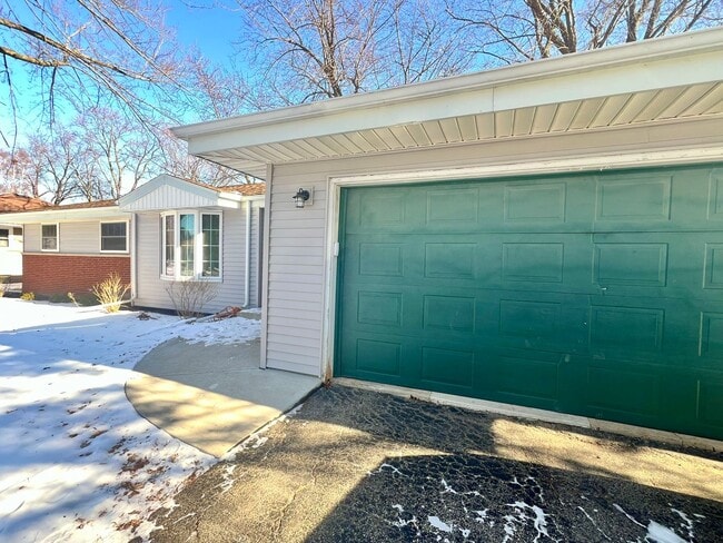 Building Photo - Spacious 4-Bedroom Home with Finished Basement & Garage