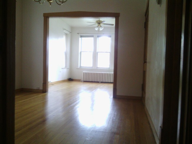 Living Room and Dining Room - 5902 W Wilson Ave