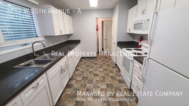 Building Photo - 3012 W 35th Ave