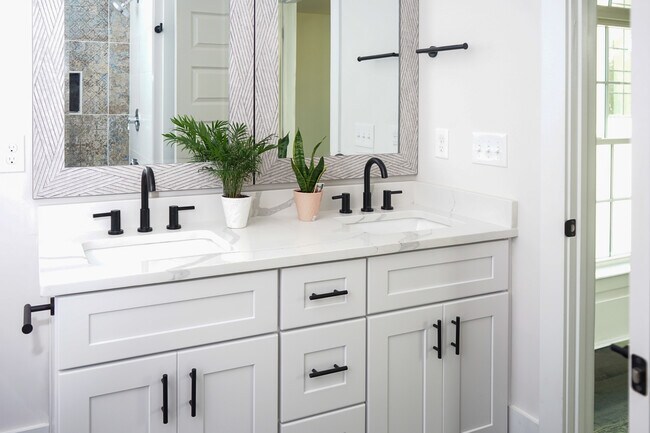 Master bathroom has exquisite textures and tiles. - 1003 Parkwood Ave