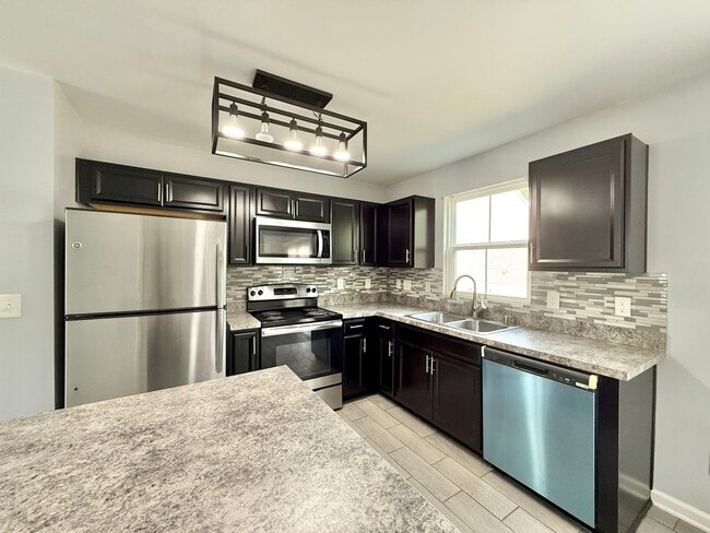 Foto del edificio - Charming 3BD, 1.5BA Clayton Home Near Shopping and Dining with Modern Updates