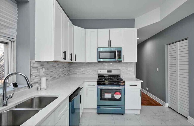 Foto del edificio - 3246 E 91st St