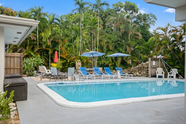 Pool with Zen like feel and pond - 602 NE 37th St Apartments