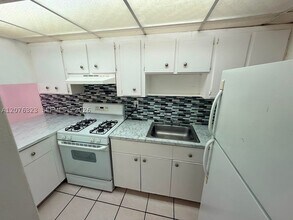 Building Photo - 1300 W 47th Pl