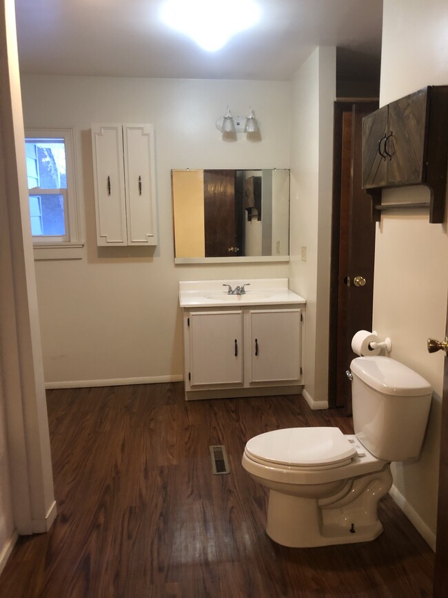 Bathroom is spacious w washer dryer hook up - 6764 Sutliff Rd