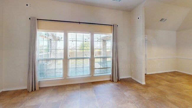 Foto del edificio - 8300 Blue Periwinkle Ln