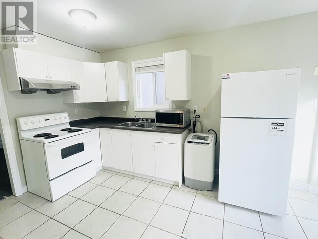 Photo du bâtiment - 552 E 45th Ave