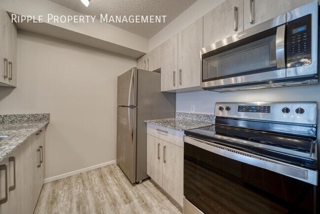 Building Photo - GREAT 2 BEDS/ 2 BATHS CONDO IN THE COMMUNITY OF SKYVIEW