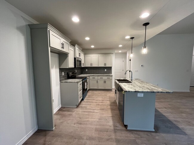 Building Photo - BRAND-NEW 3-bedroom, 2-bath home with Spri...