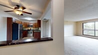 This single-floor residence offers a thoughtfully designed layout that balances functionality and comfort throughout its living spaces. The kitchen is a standout feature, showcasing rich medium-toned wood cabinetry, dark granite countertops, tile flooring, and a full suite of stainless steel appliances including an electric range, over-the-range microwave, and refrigerator. A breakfast bar provides a convenient transition into the adjacent living area. The open-concept living space is generously sized, finished with neutral-toned wall-to-wall carpeting and a ceiling fan, creating a bright and airy atmosphere. A column detail adds architectural interest and helps delineate the kitchen from the main living area. The bedroom features plush carpeting, a window that brings in natural light, and a spacious walk-in closet with built-in wire shelving on both sides, offering exceptional storage. The bathroom is well-appointed with tile flooring, beige wall tile surrounding the soaking bathtub and shower combination, a wood vanity, and chrome grab bars for added accessibility and safety. Throughout, the space maintains a consistent, clean aesthetic with textured ceilings and warm neutral tones.