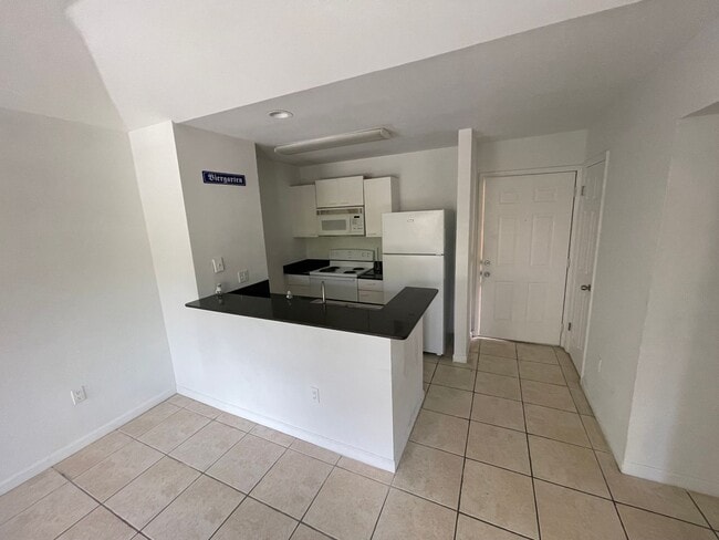 Building Photo - Palm Lakes Condominium